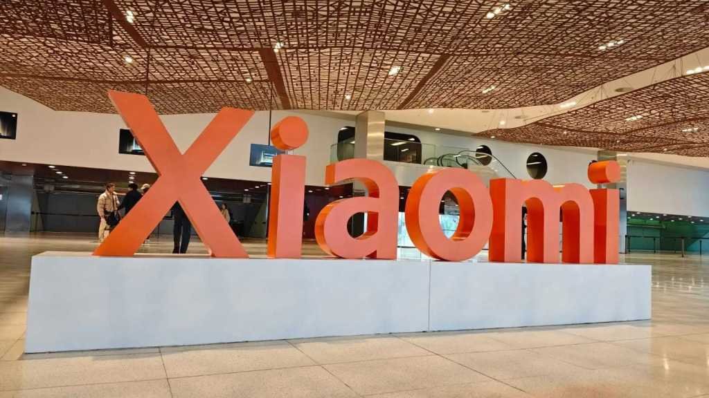 Everything Xiaomi announced at MWC 2026 The Xiaomi logo in a large orange sculpture